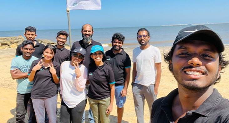 Swivel staff at beach clean-up event